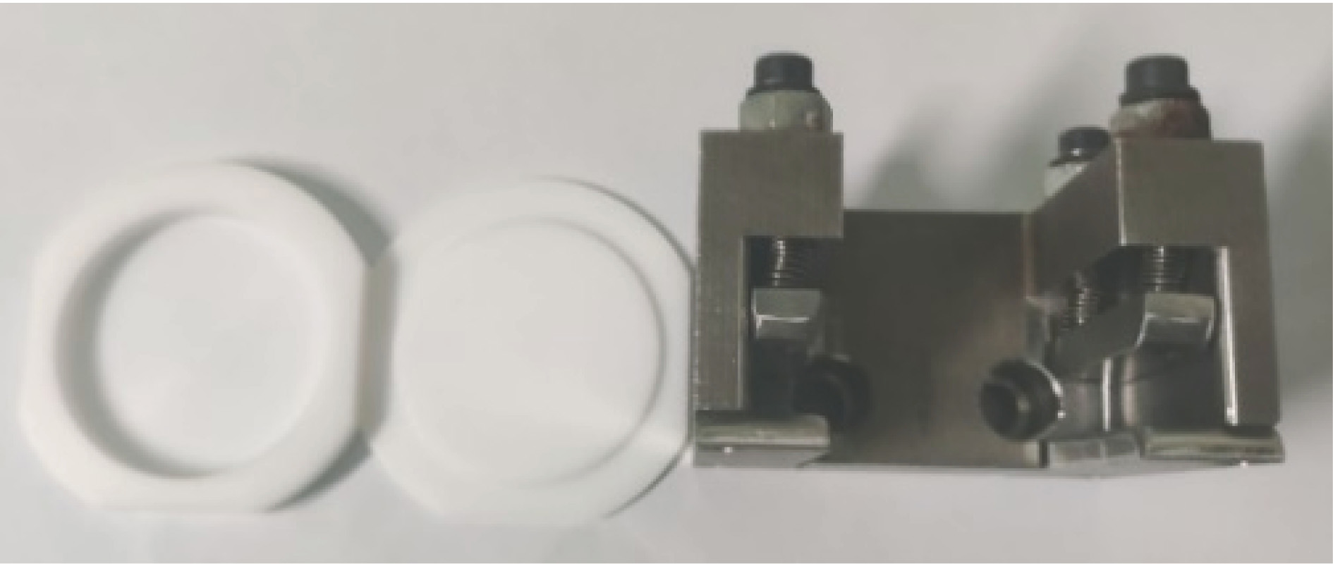 PTFE sample cell and its stainless steel fixture