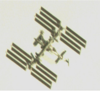 Image of the International Space Station taken by video remote sensing satellite