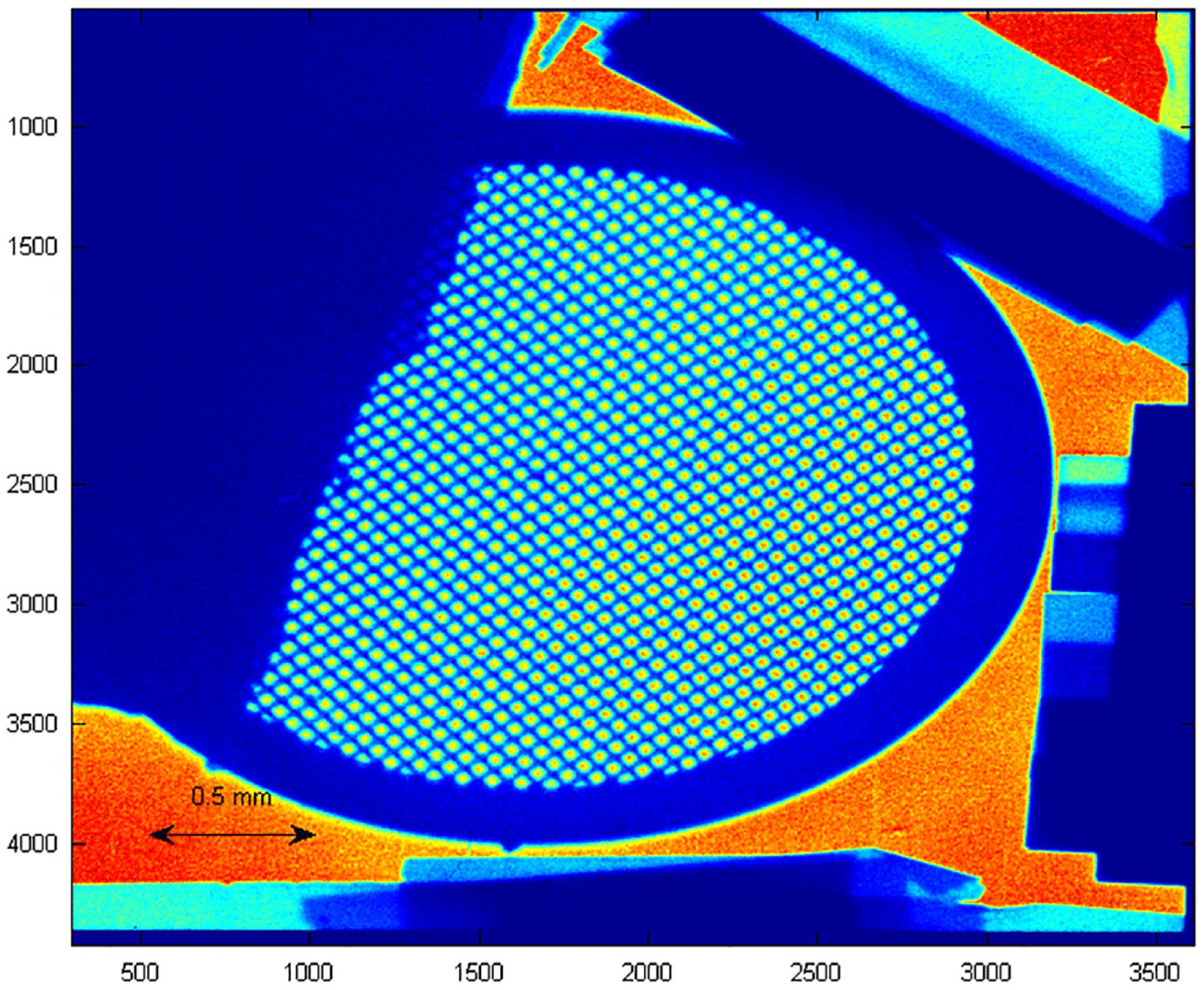 Raw data of the radiography. The projected object is a 400 lpi gold grid. In addition, there are step targets of plastic and aluminum to estimate the dynamic resolution.