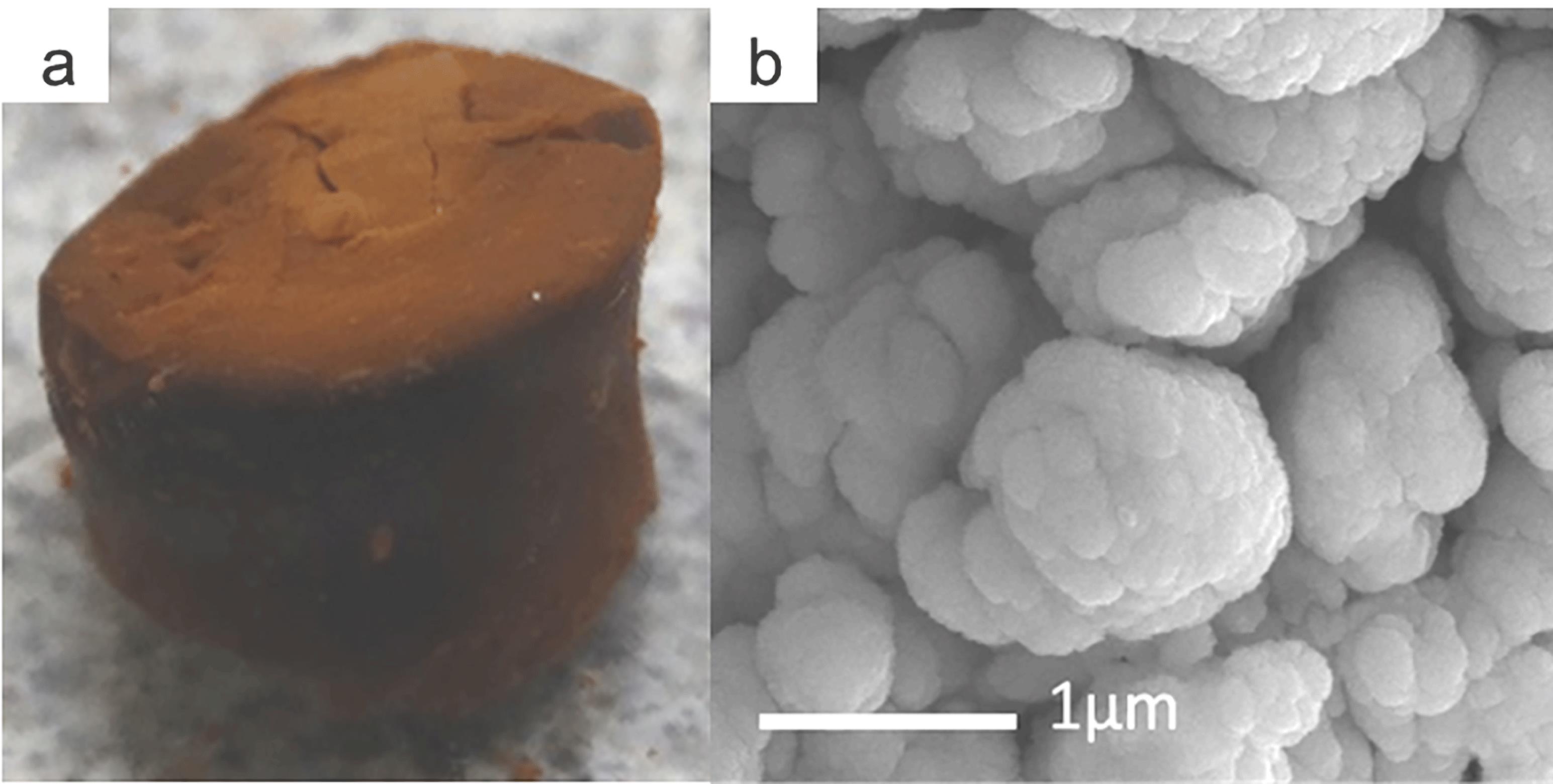 Fe (III)-based aerogel synthesized using PO (a) monolith, (b) SEM showing the larger clusters are made up of nanoparticles in the 70–100 nm range.