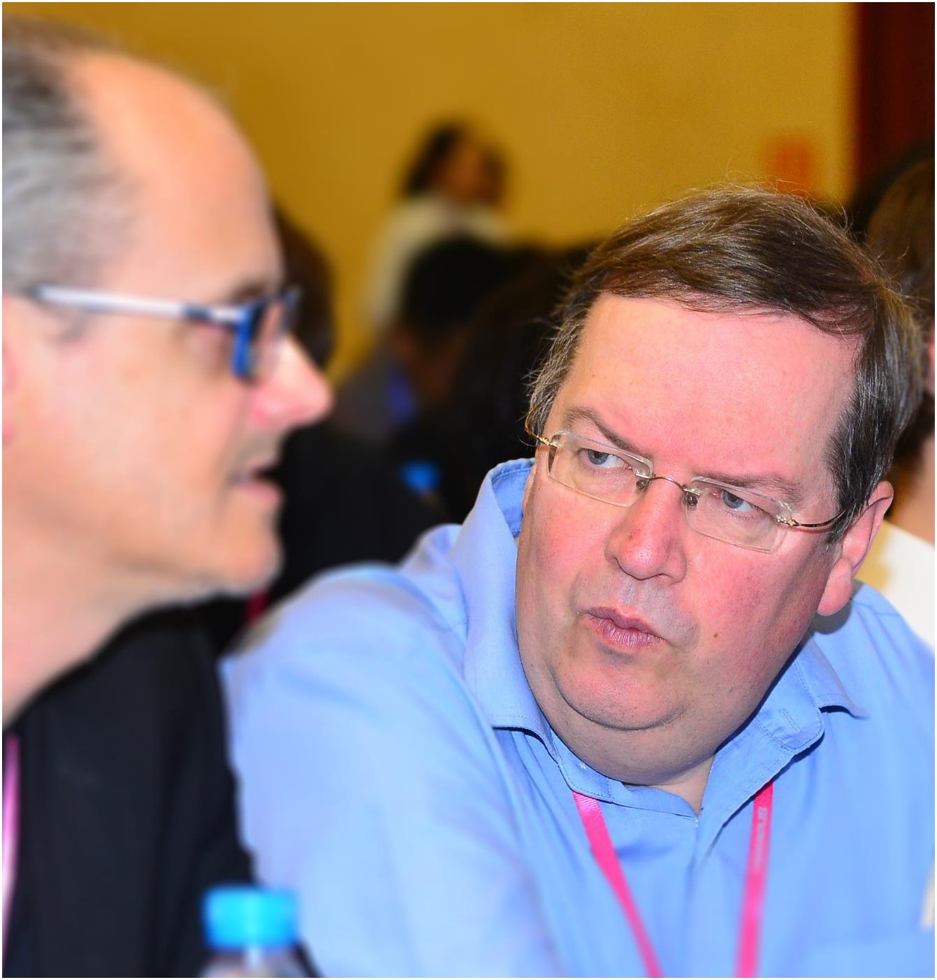 David Neely (right) in discussion with Leonida Gizzi (Istituto Nazionale di Ottica, Pisa, Italy) at the HPLSE symposium, Suzhou, China, 2018.