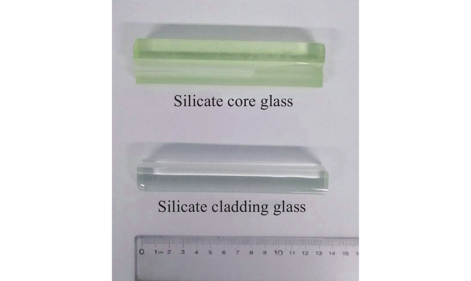 Fabricated silicate core glass and cladding glass