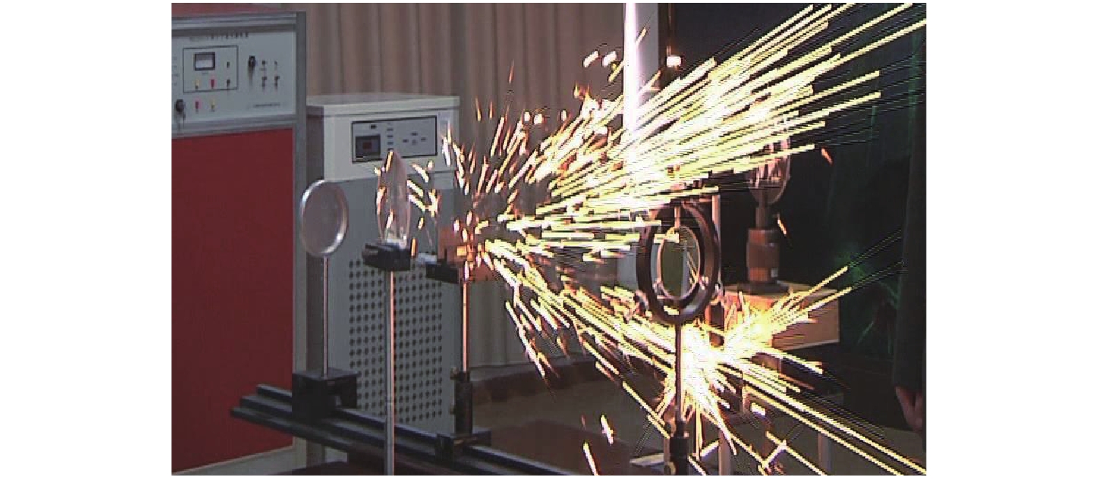 Metal ejection under free running laser irradiation