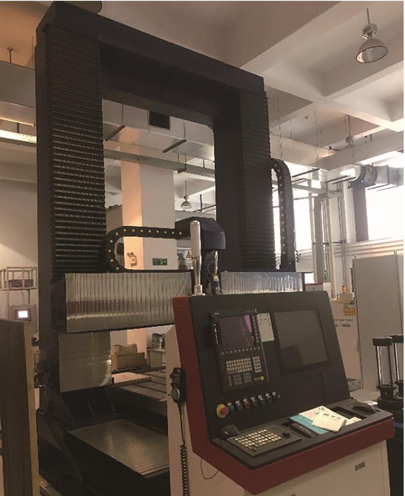 Laser additive manufacturing system used in the experiment